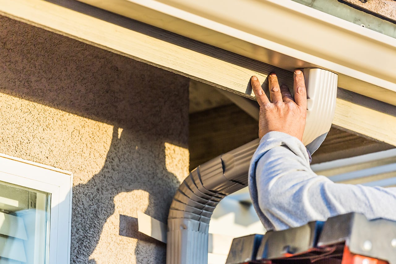 Installing Gutter Downspouts